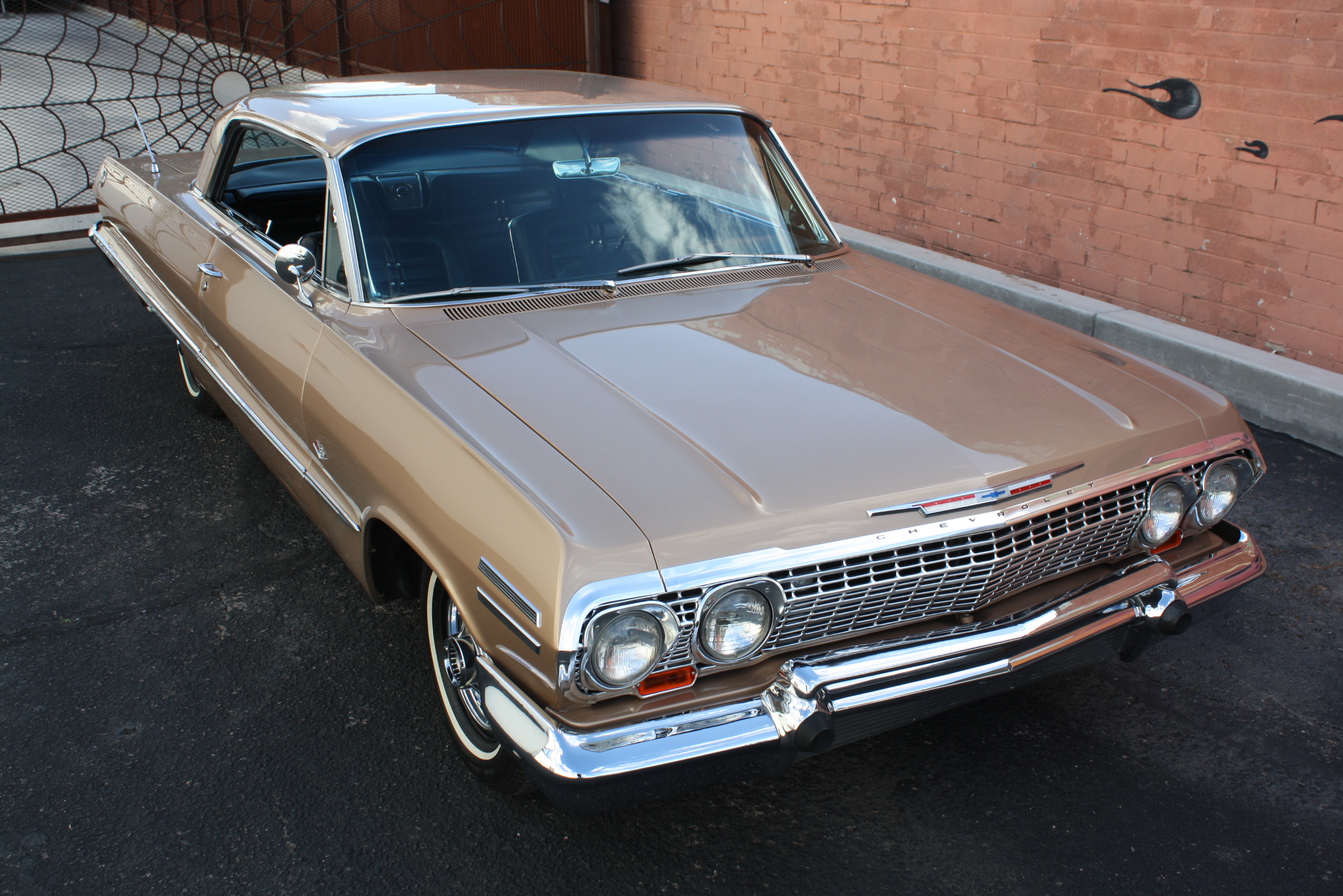 1963 Impala SS in special order “Anniversary Gold.”