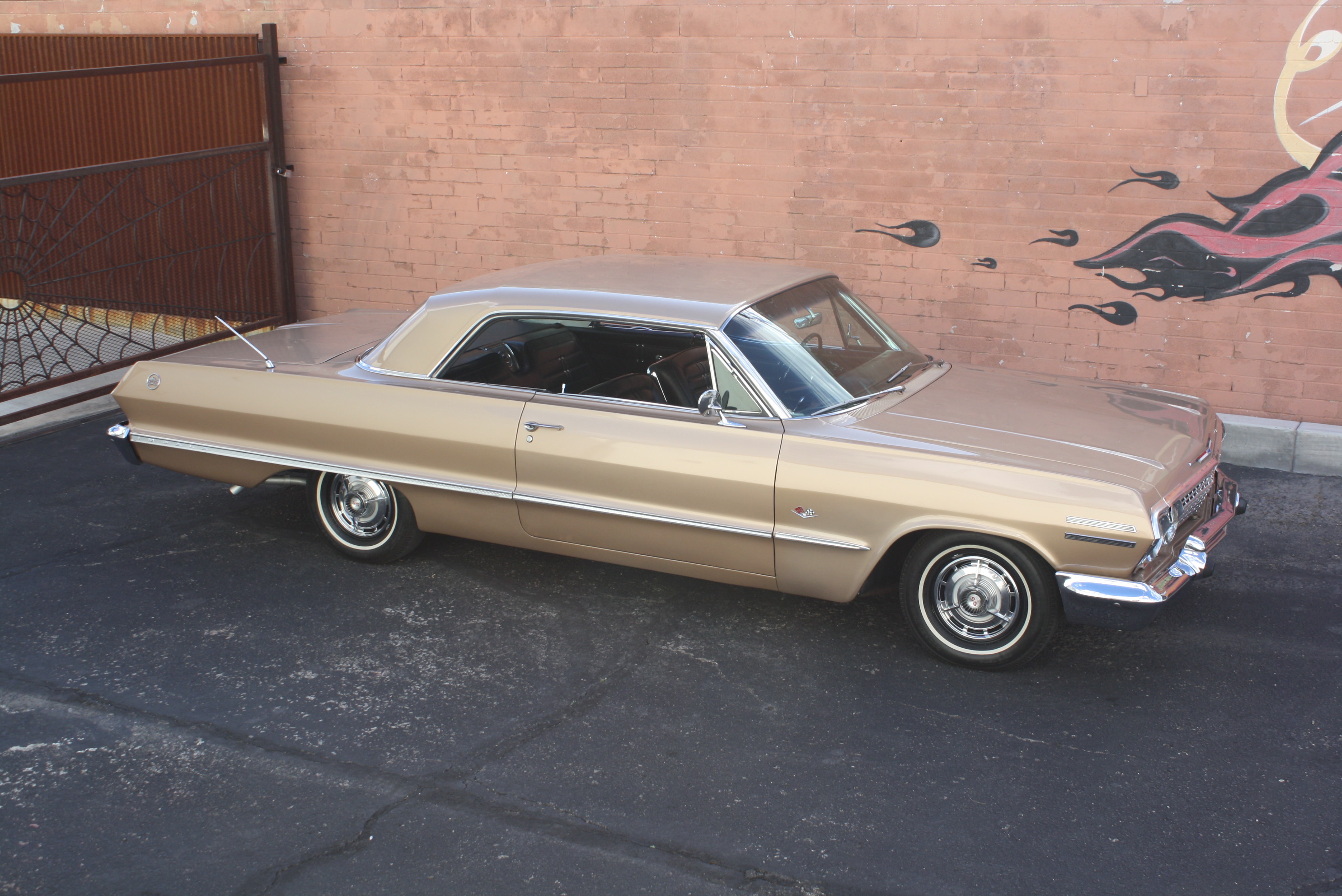 1963 Impala SS in special order “Anniversary Gold.”