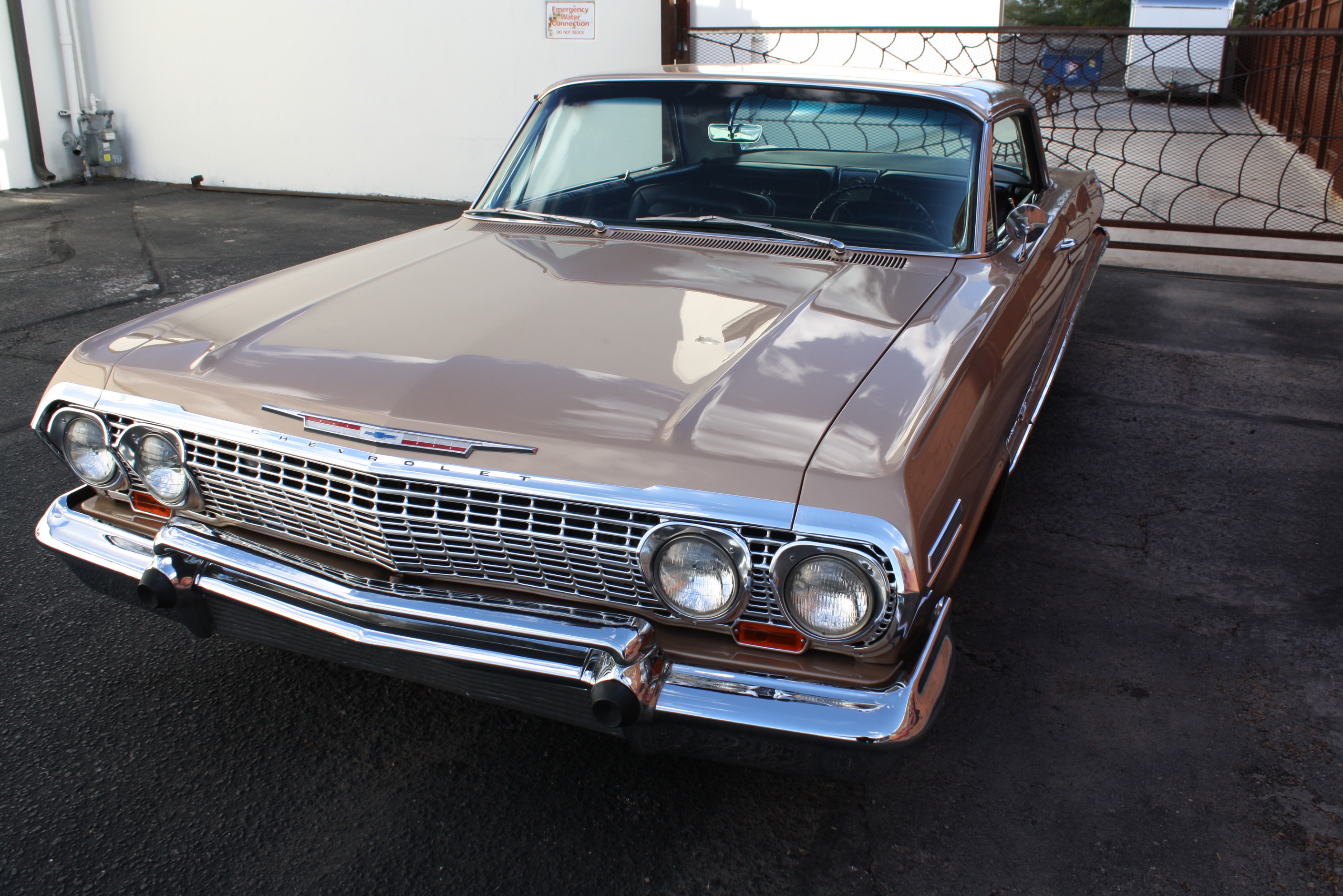 1963 Impala SS in special order “Anniversary Gold.”