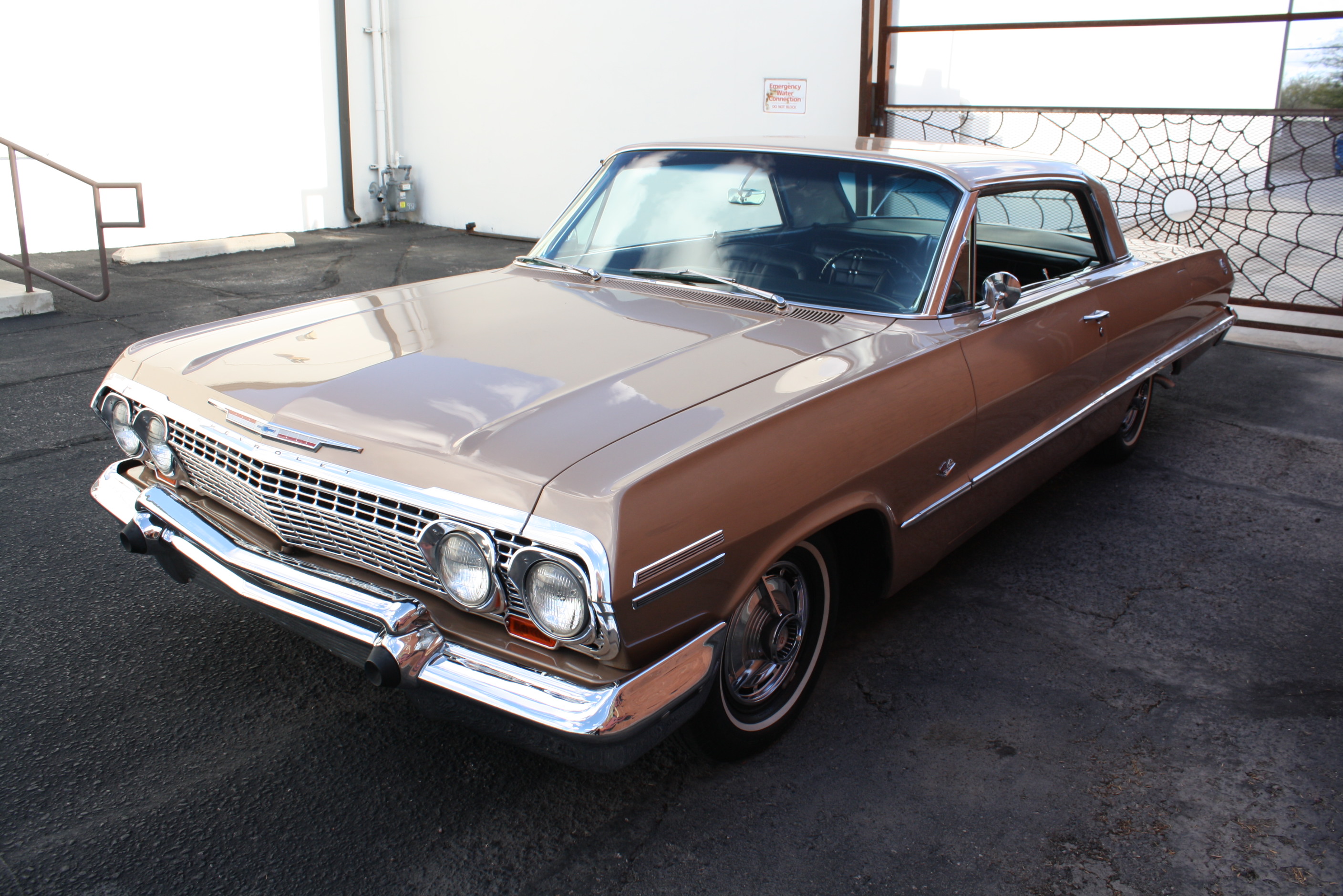 1963 Impala SS in special order “Anniversary Gold.”