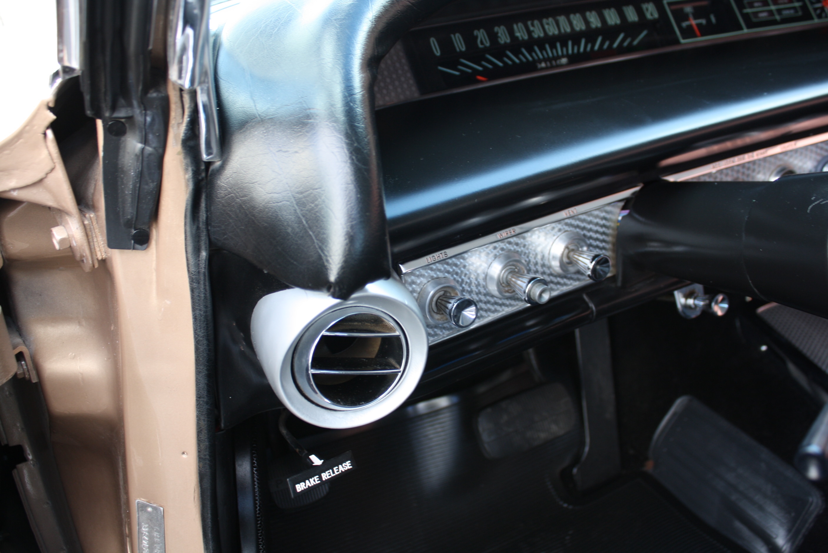1963 Impala SS in special order “Anniversary Gold.”
