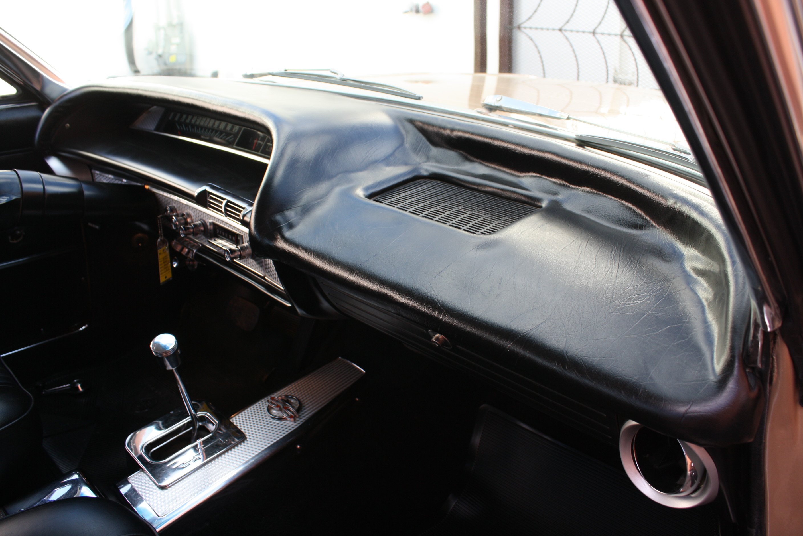 1963 Impala SS in special order “Anniversary Gold.”