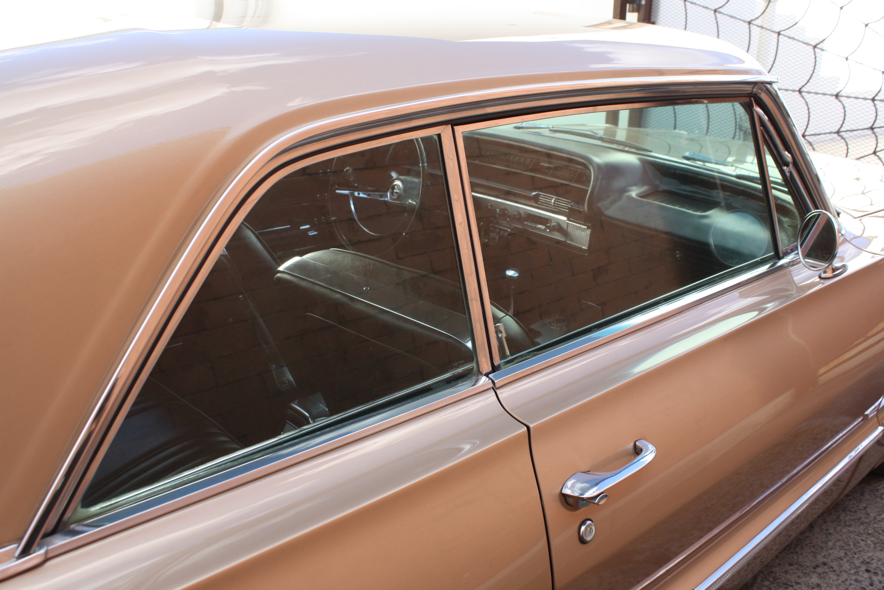 1963 Impala SS in special order “Anniversary Gold.”