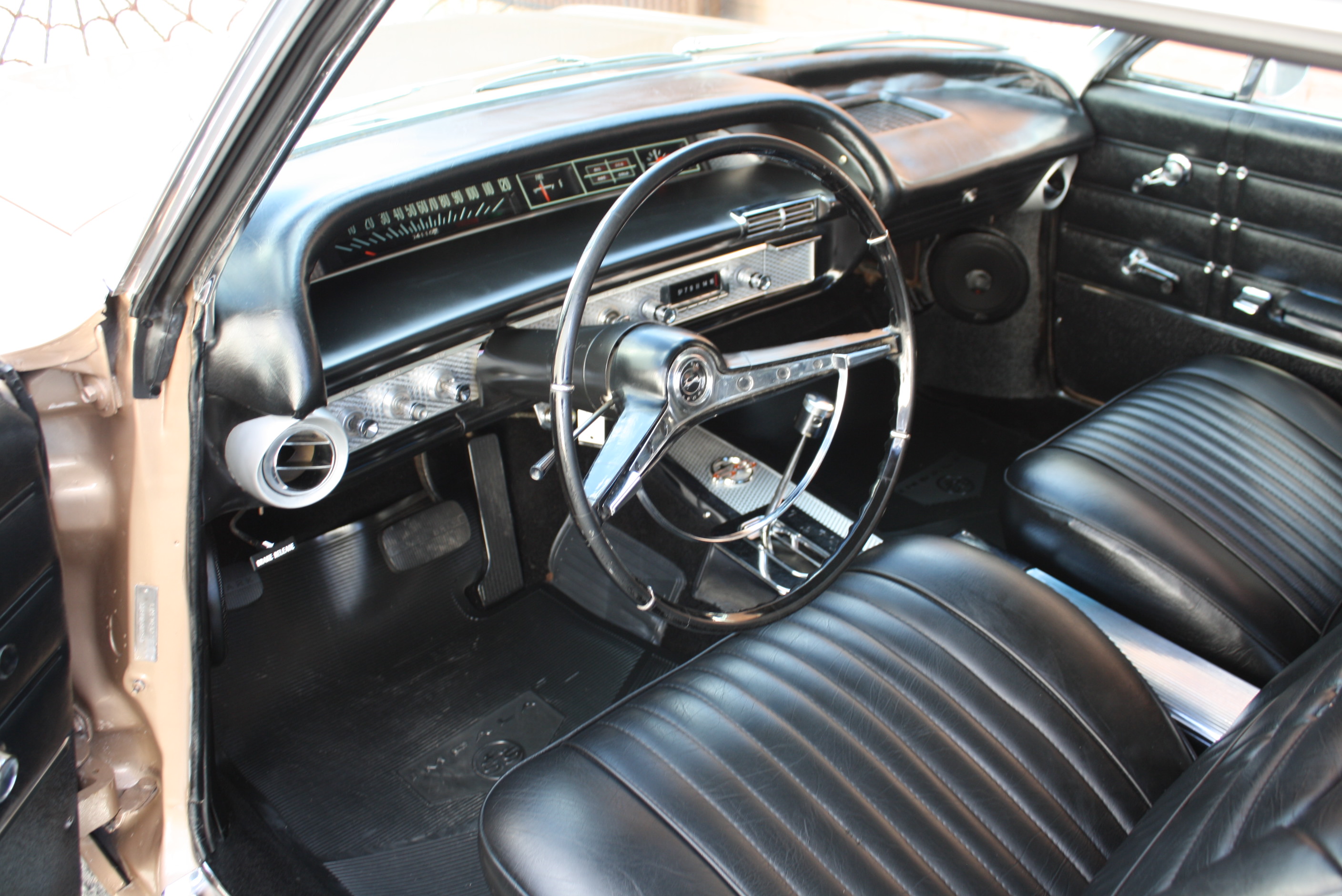 1963 Impala SS in special order “Anniversary Gold.”
